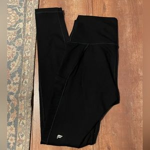 black Fabletics high waisted leggings with mesh pockets size extra small